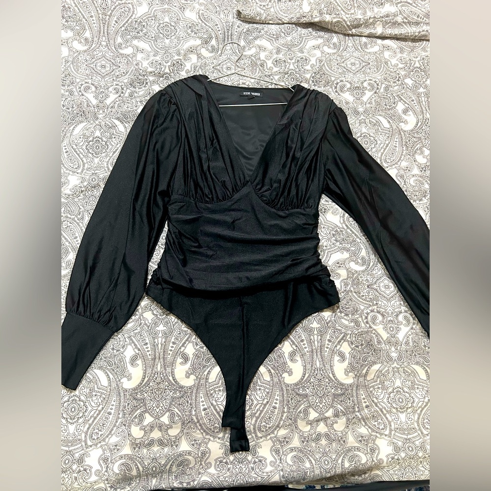Steve Madden, with slight shoulder pads, leotard style.